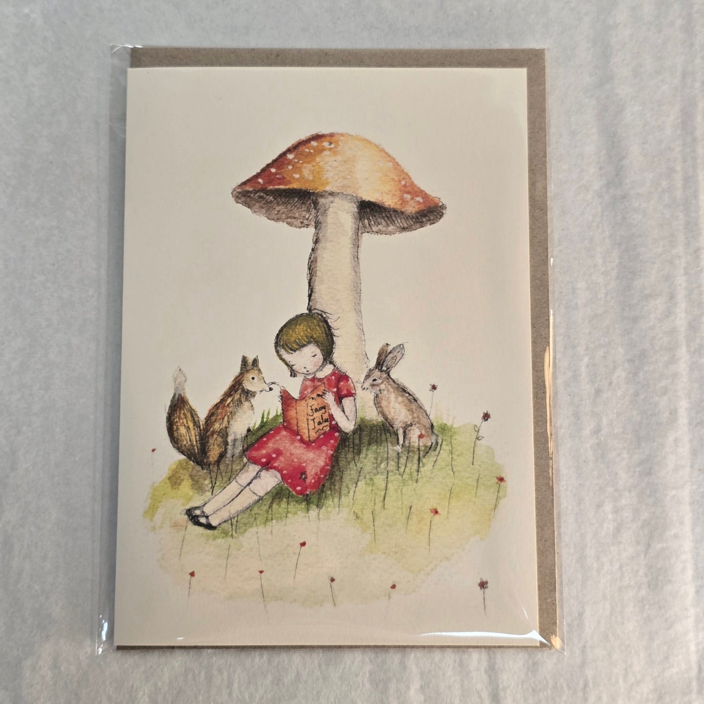 Nuovo Card - Reading under the Mushroom