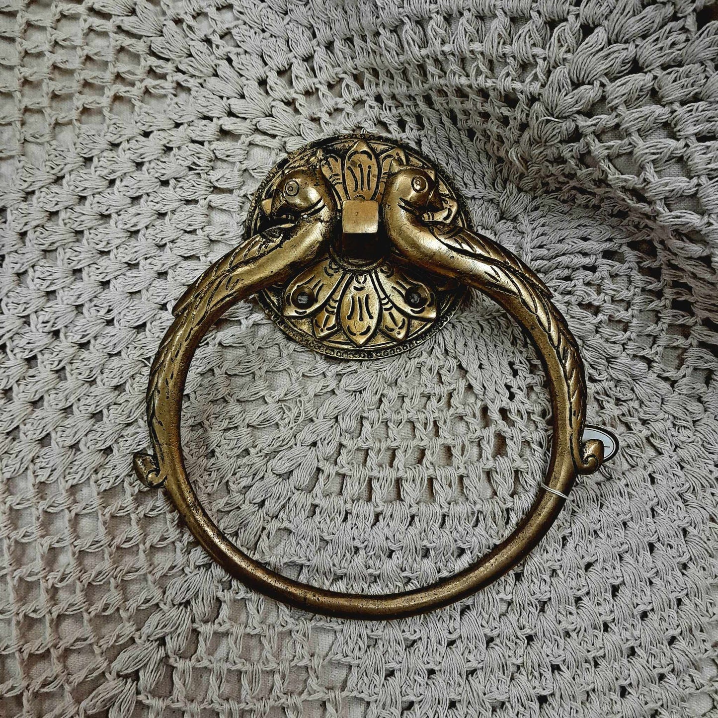 Peacock brass door knocker